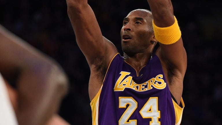 Lakers forward Kobe Bryant shoots a free throw against the...
