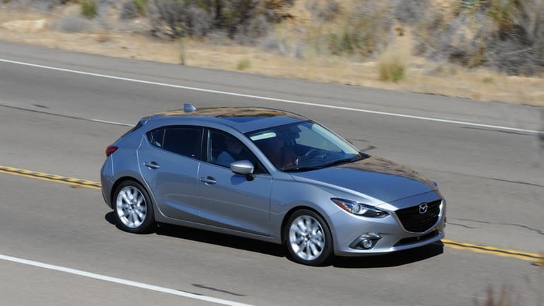 Though the Mazda3 competes in the compact class against popular...