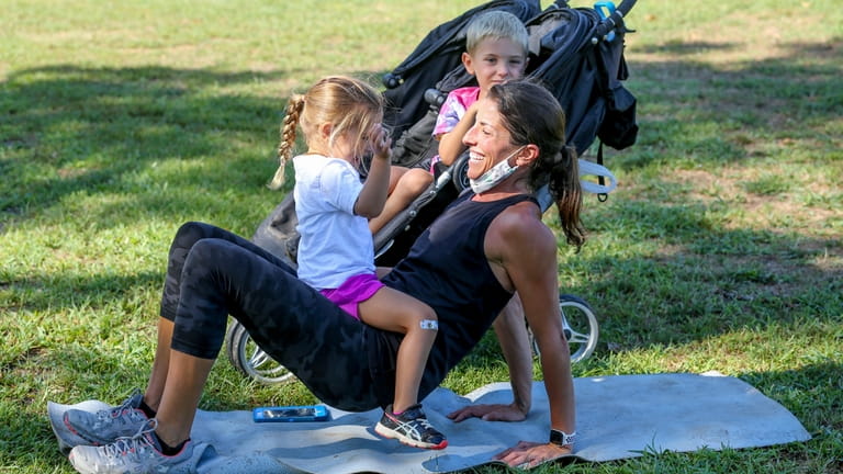 Fitness instructor Rachel Goodale, with her daughter Reagan, and son Reece,...