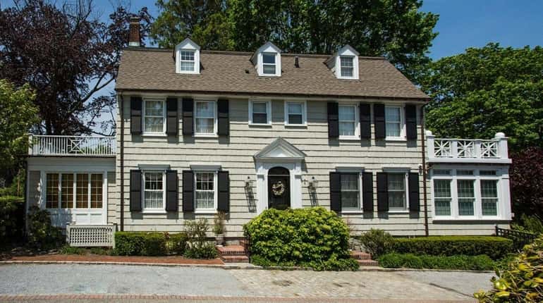 This $850,000 waterfront house that inspired "The Amityville Horror" has...