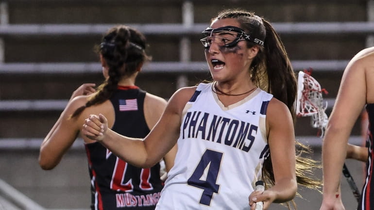 Julia Fusco of Bayport-Blue Point reacts to her first goal...