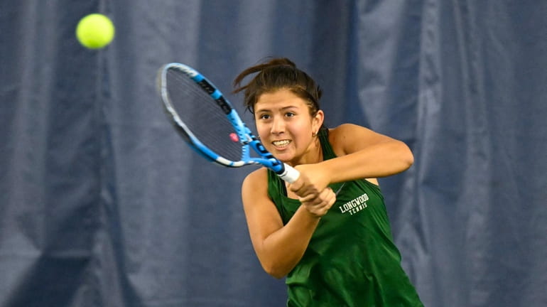 Longwood’s Victoria Matos, plays in the NYSPHSAA Tennis Championship final...