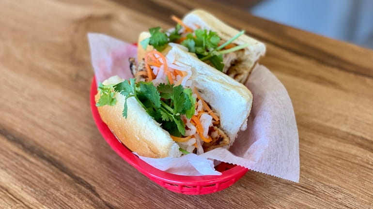 A grilled barbecue chicken banh mi at The Rolling Spring Roll...