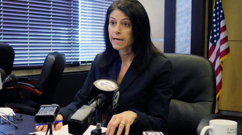 Michigan Attorney General Dana Nessel addresses the media during a...
