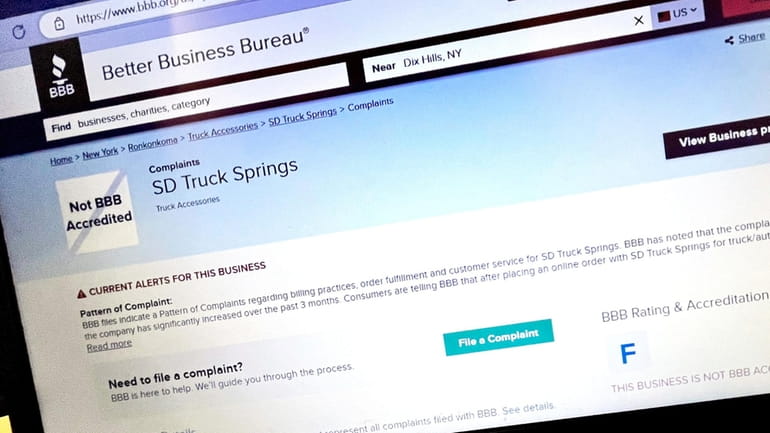 A screen shot of the Better Business Bureau website shows its "F" rating for...