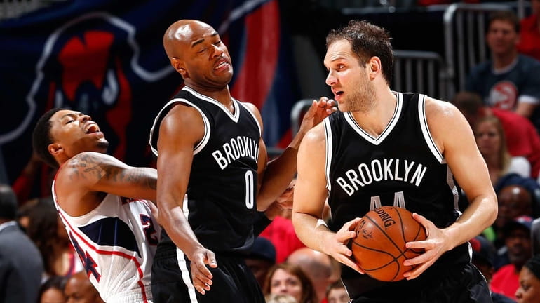 Jarrett Jack #0 of the Brooklyn Nets is called for...