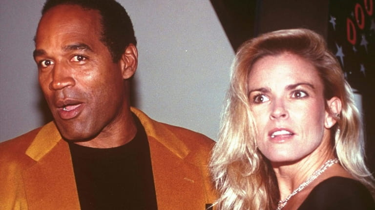O.J. Simpson and his wife, Nicole Brown Simpson, arrive for...