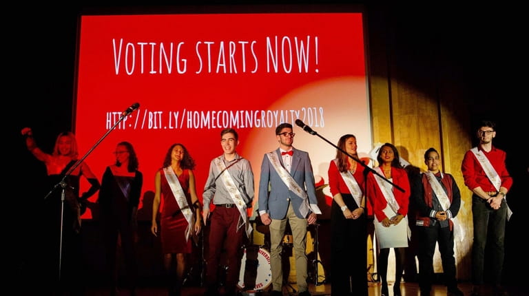 Finalists for Stony Brook University's homecoming court gather on stage...