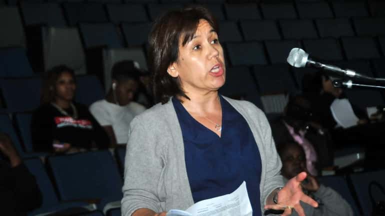 School board candidate Maribel Toure addresses the Hempstead School Board...