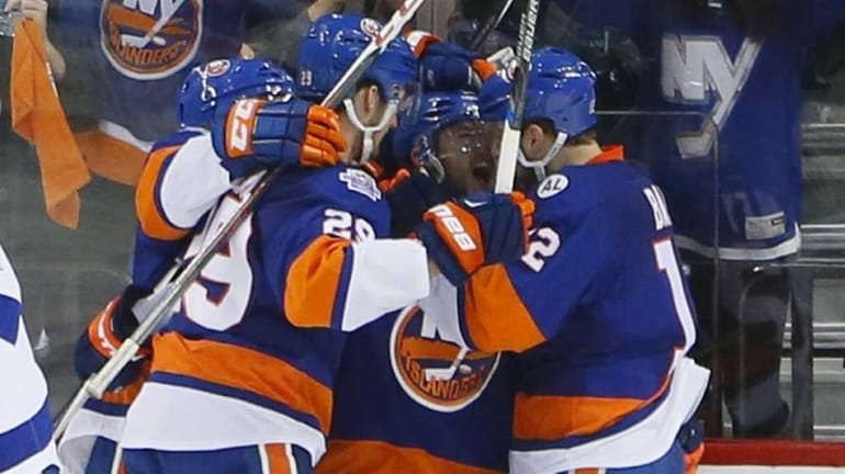 New York Islanders left wing Josh Bailey (12) celebrates the...