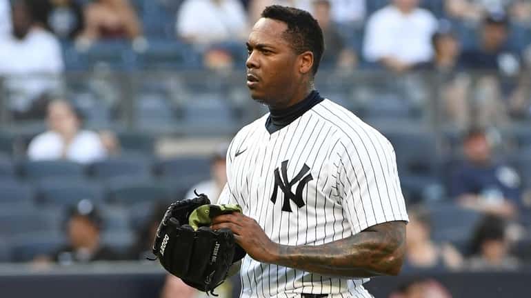 Yankees relief pitcher Aroldis Chapman is booed by fans as...