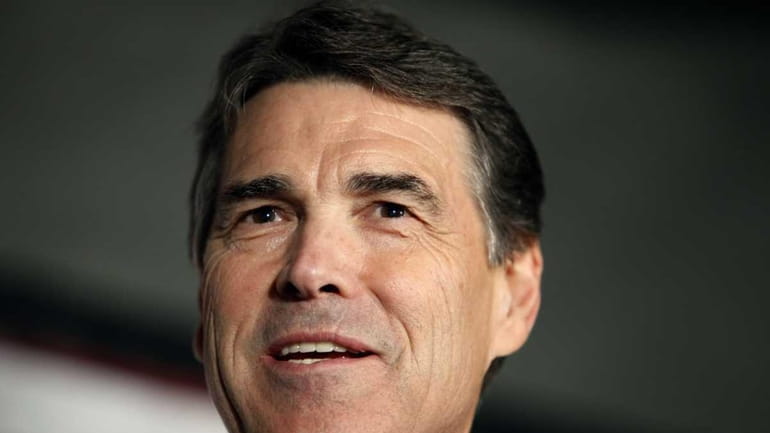 Republican presidential candidate Texas Gov. Rick Perry speaks to Republicans...