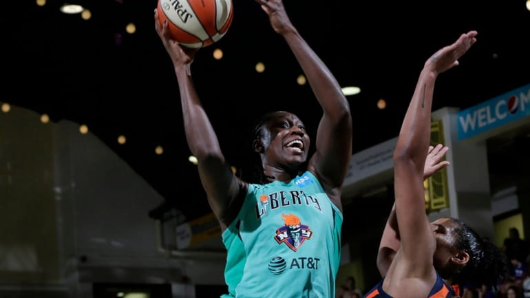 Liberty center Tina Charles shoots the ball against the Sun on...