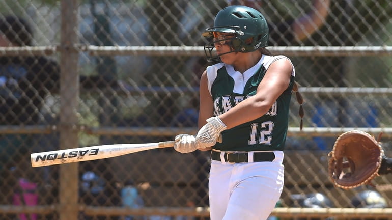 Alyssa Rodriguez #12 of Seaford belts a three-run double during...