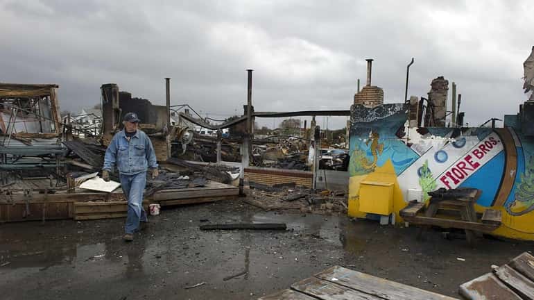 The remains of Fiore Bros. Fish Market in Freeport after...