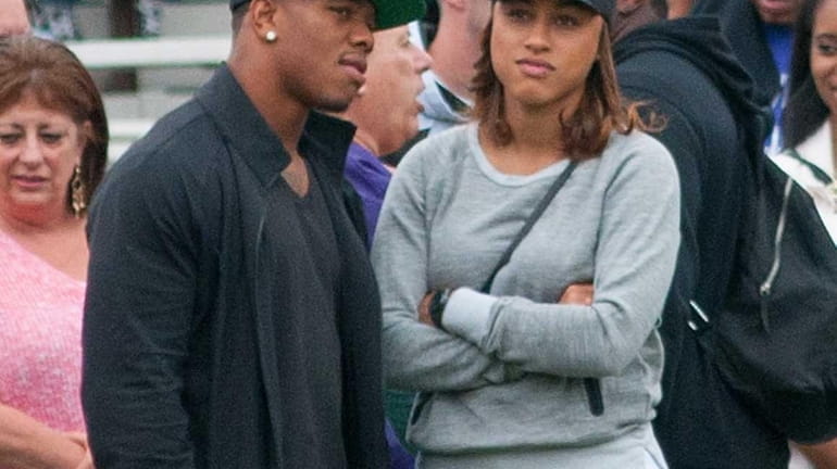 Ray Rice and wife Janay attend a New Rochelle High...