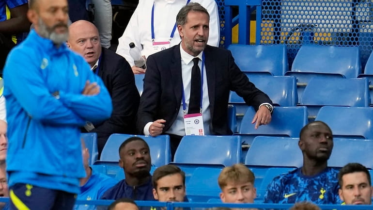 FILE - Tottenham Managing Director Fabio Paratici sits on the...