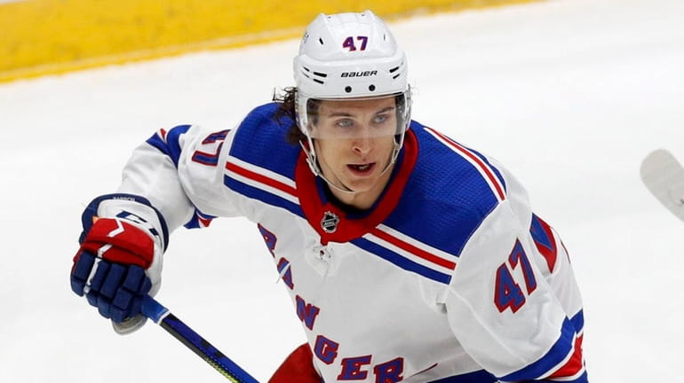 Morgan Barron of the New York Rangers skates against the...