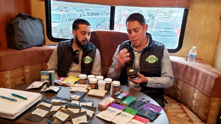 The Cannabis Place general manager Khaled Ahmed, left, and CEO...