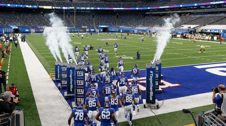 The Giants take the field for a game against the Pittsburgh...