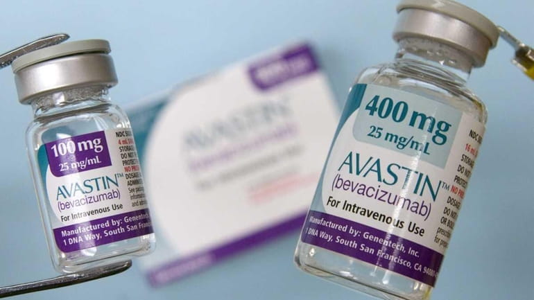 Roche's colon-cancer drug Avastin is displayed in a Cambridge, Mass....