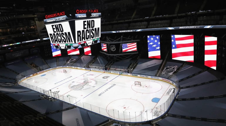 "End Racism" is displayed on the scoreboard in light of...