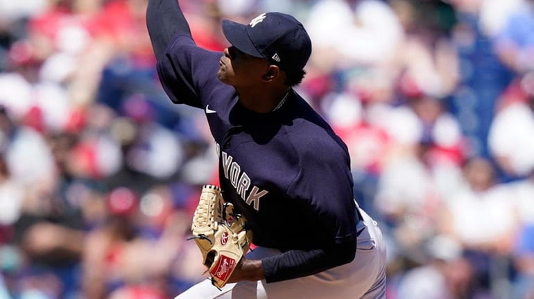 Yankees starting pitcher Luis Severino throws during the first inning...