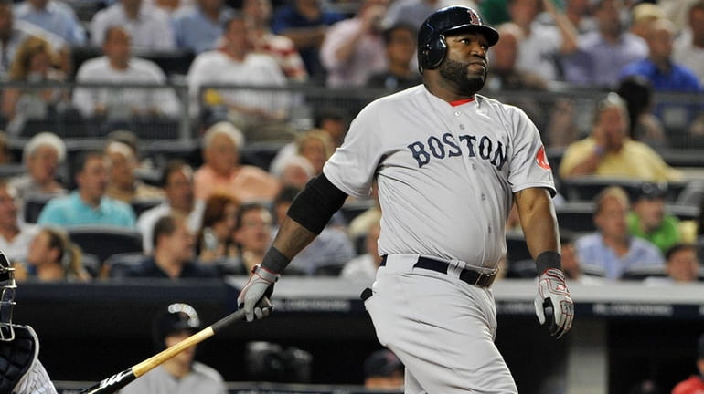 Boston Red Sox designated hitter David Ortiz  watches his two-run...