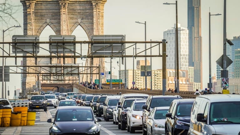Traffic enters lower Manhattan after crossing the Brooklyn Bridge, Feb....
