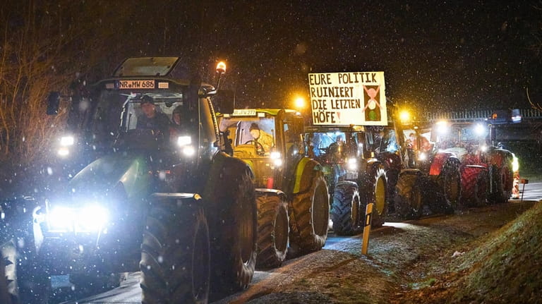 Farmers with tractors protest against the federal government's austerity measures...