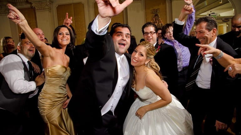 Ashley Waxman and Salvatore Di Santo were married at the...