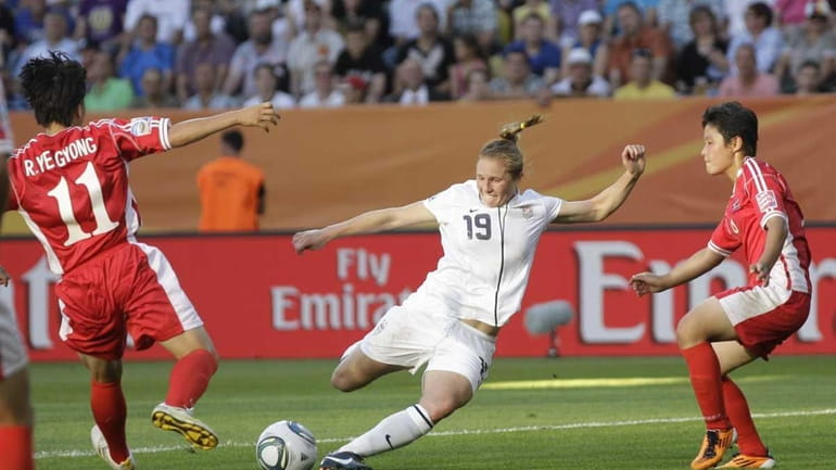 Rachel Buehler scores Team USA's second goal during the group...