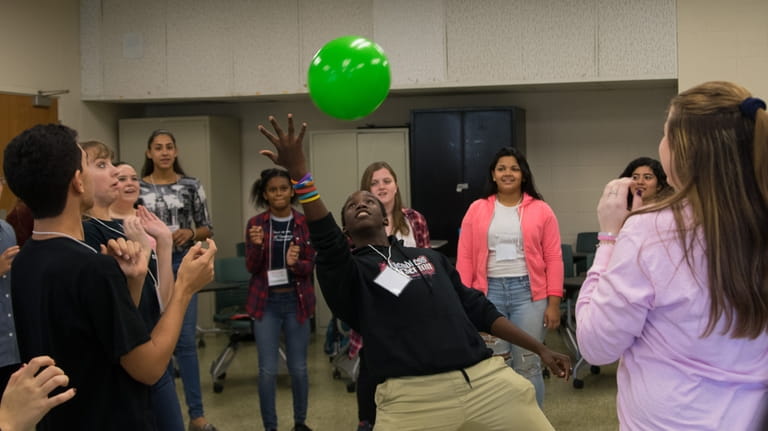 Participants get moving in a workshop called “Speak Out —...