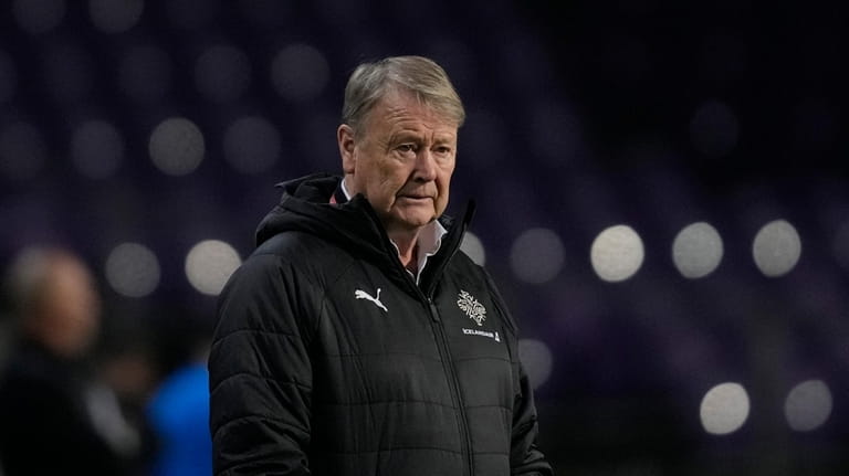 Iceland's coach Age Hareide stands during the Euro 2024 qualifying...