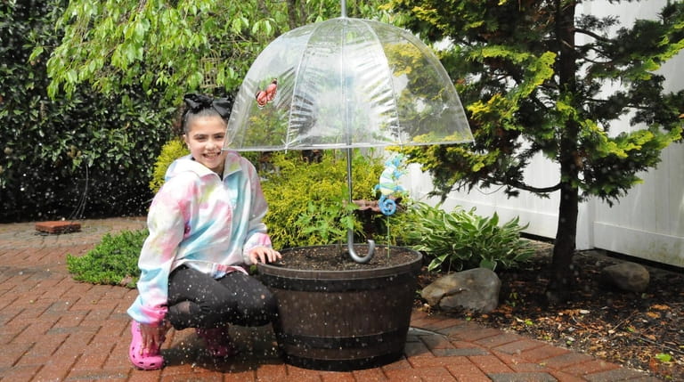 Alayna Gottesman, 9, of Farmingville, takes extraordinary measures to protect...