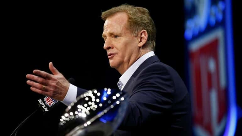 NFL commissioner Roger Goodell responds to questions during a news...