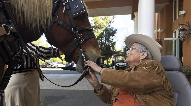 Opal Hagerty, 95, of Escondido meets Blossom, a 16-year-old Belgian...