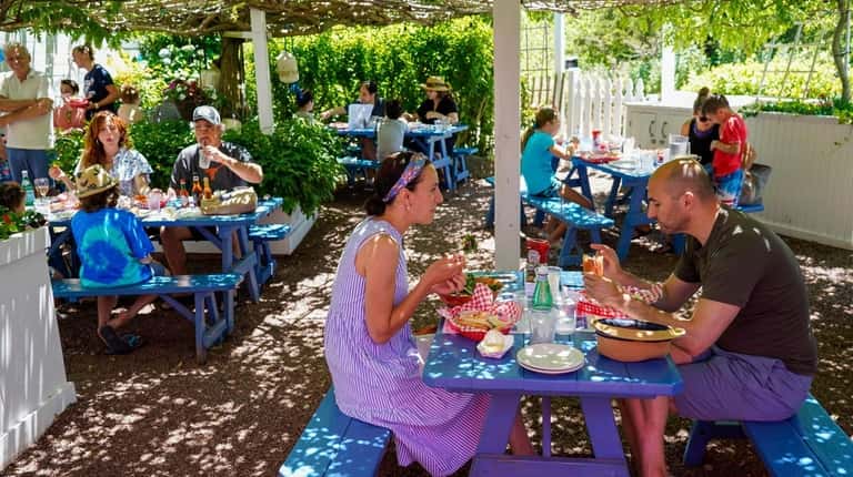 Outdoor diners enjoy lunch at The Lobster Roll in Amagansett.