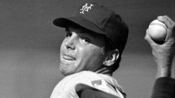 New York Mets starting pitcher Tom Seaver winds up for...