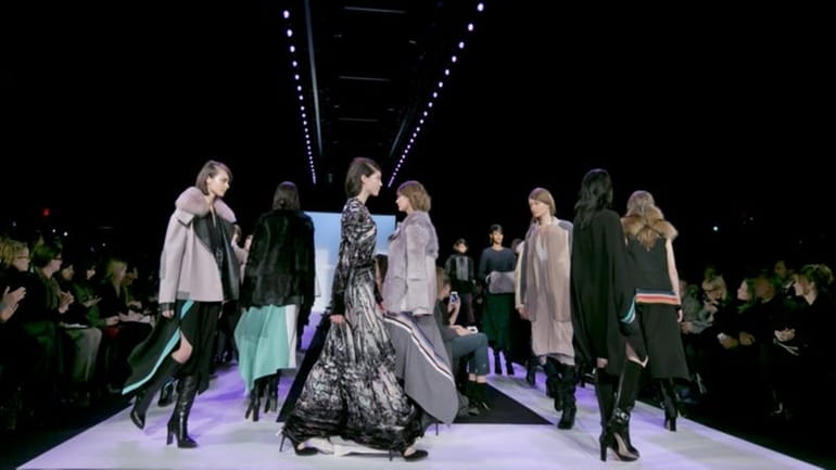Models walk in the finale of the Fall 2014 BCBG...