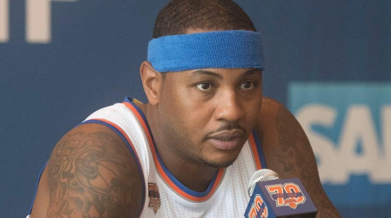 The New York Knicks' Carmelo Anthony speaks during Media Day...