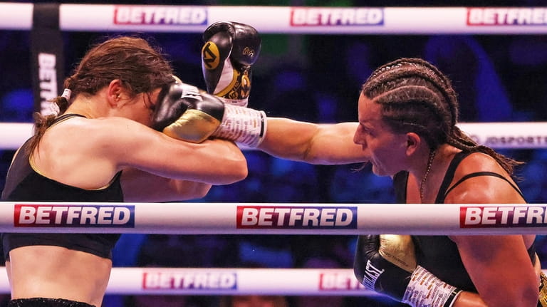 Britain's Chantelle Cameron, right, lands a punch on Ireland's Katie...