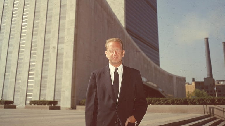 Secretary-general of the United Nations Dag Hammarskjöld, standing outside U.N. headquarter in Manhattan in 1956,...