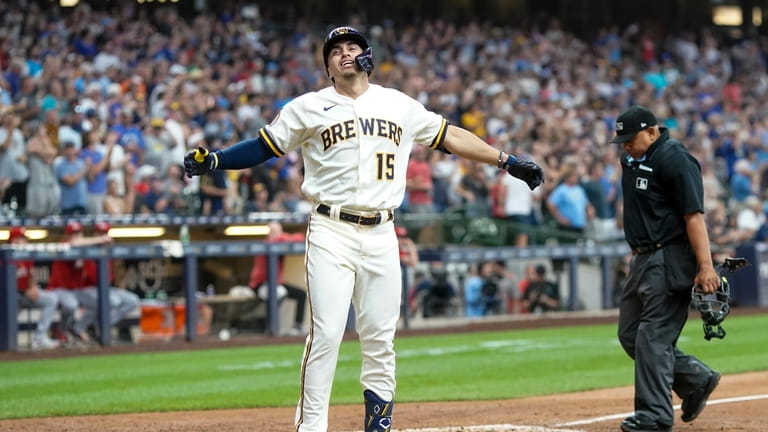 Milwaukee Brewers' Tyrone Taylor reacts after hitting a two-run home...