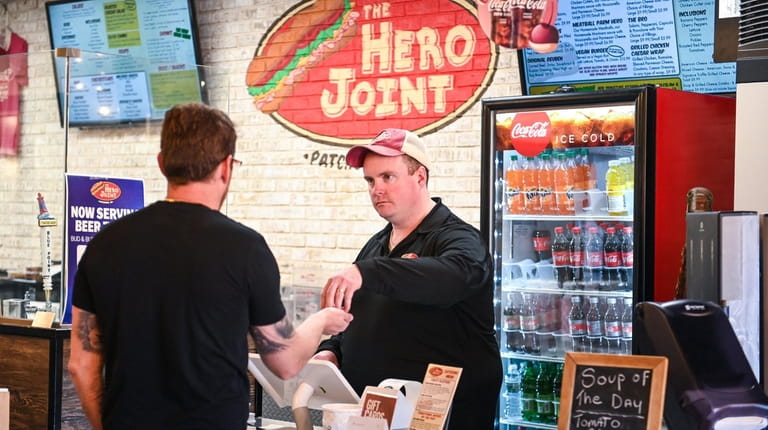 John Murray III, owner of The Hero Joint sandwich shop,...