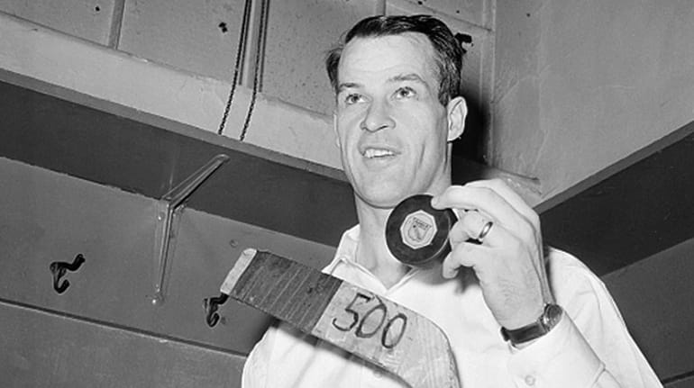 Gordie Howe of the Detroit Red Wings poses with the...