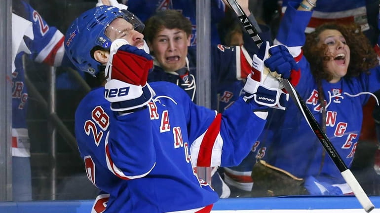 Dominic Moore of the New York Rangers celebrates his third-period...