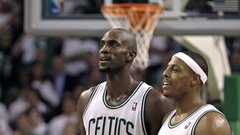 Boston Celtics power forward Kevin Garnett, left, and teammate Paul...