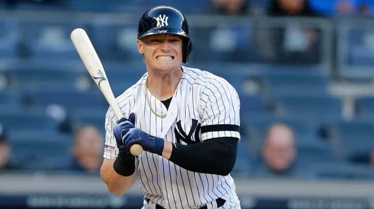 Clint Frazier of the Yankees reacts after taking a strike during...