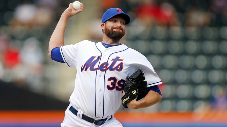 Bobby Parnell delivers a pitch in the ninth inning of...